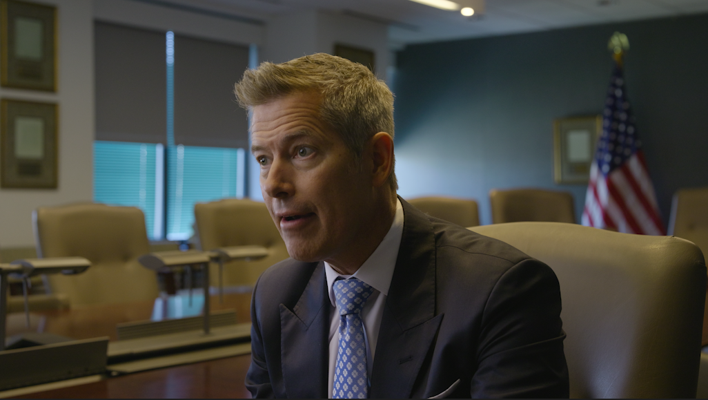 Interview in a government conference room from a Wrong Speak Films documentary